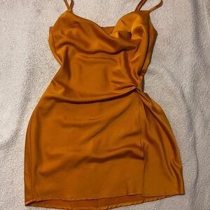 Orange satin mini dress with small slit